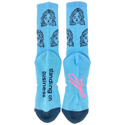 standing on business - blue socks